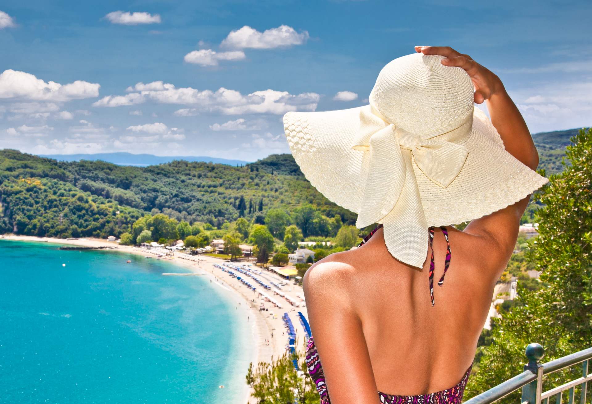woman looking on Valtos beach near Parga town