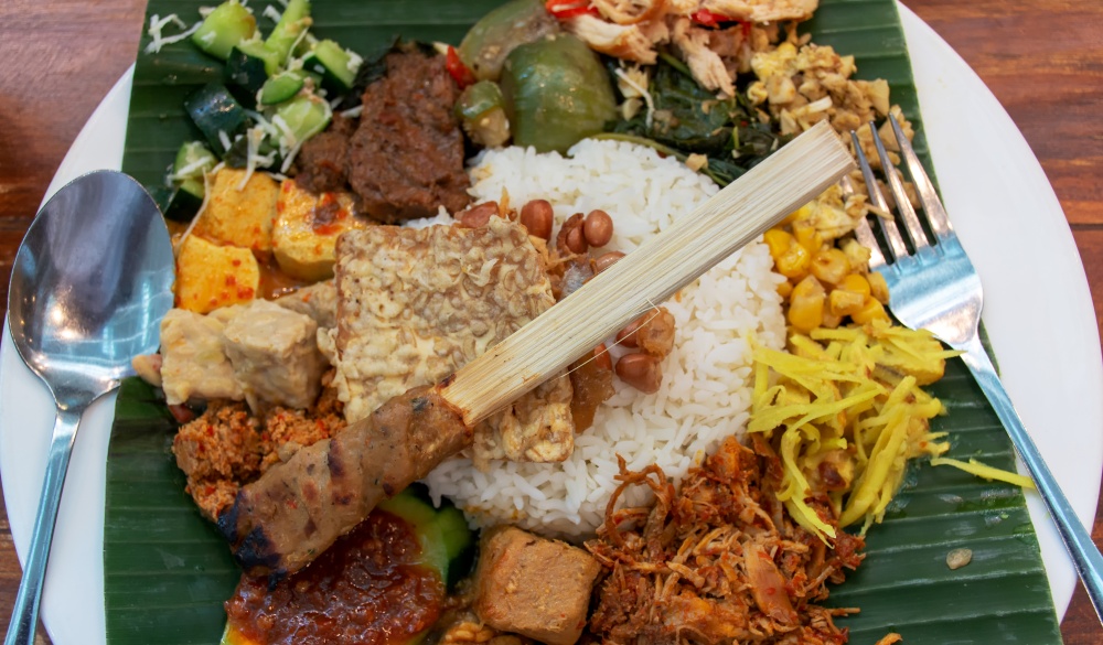 Rice dish with small portions of various side dishes