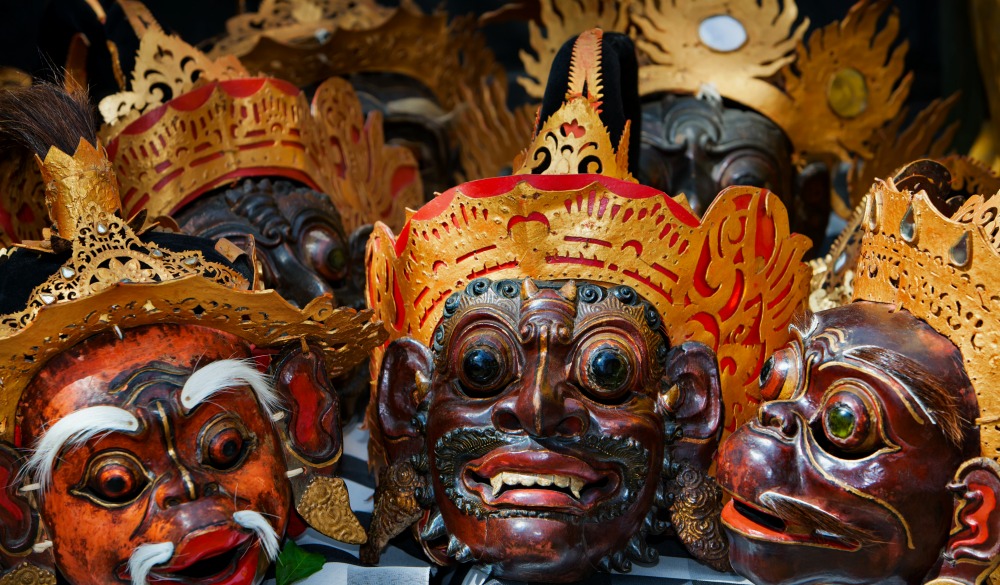 Old traditional balinese costumes and masks Tari Wayang Topeng - characters of Bali island culture. Temple ritual dance at ceremony on religious holiday. Ethnic festivals, arts of Indonesian people