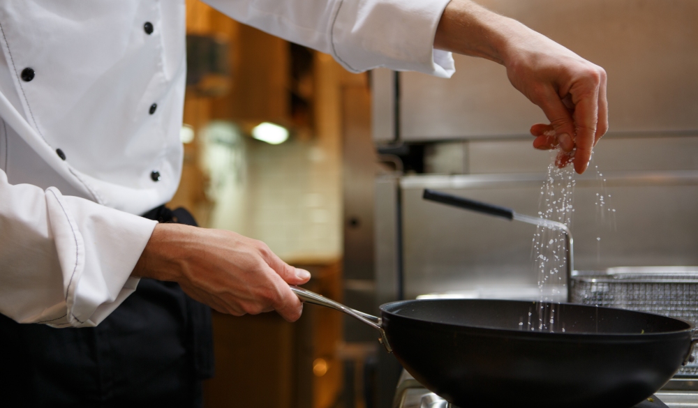 Chef preparing food; Shutterstock ID 230067286