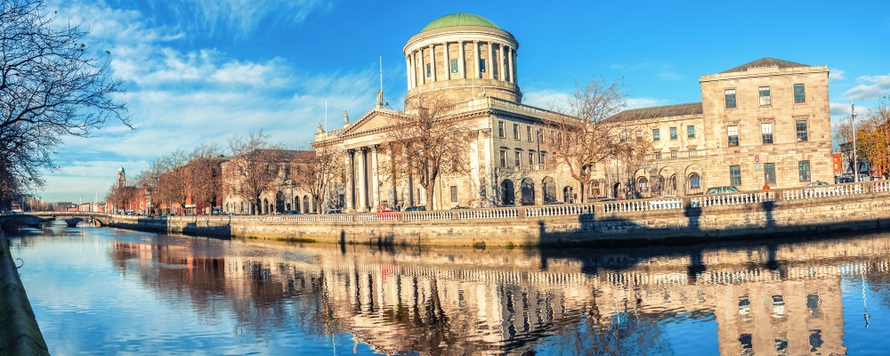 Four courts building in Dublin, Ireland with river Liffey; Shutterstock ID 364601453