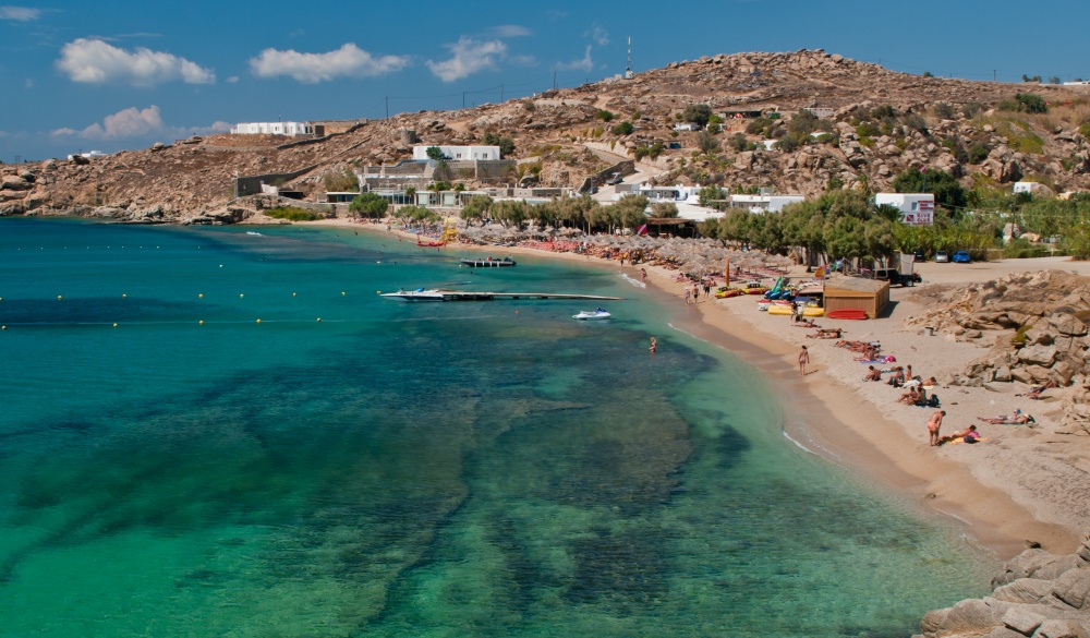 Paradise beach of Mykonos, Greece. Sunny with blue sky and crystal clear water; 