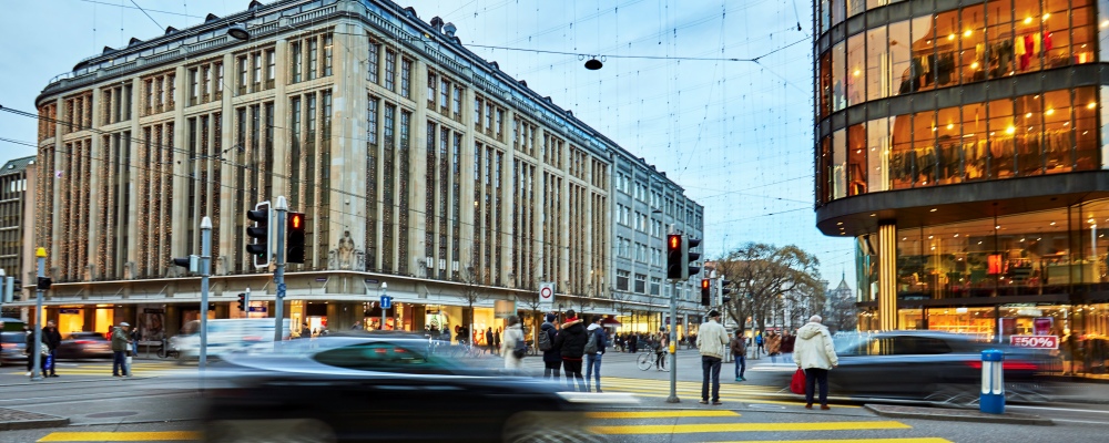 Pedestrian crossing with electric car on the corner of Bahnhofstrasse and Uraniastrasse