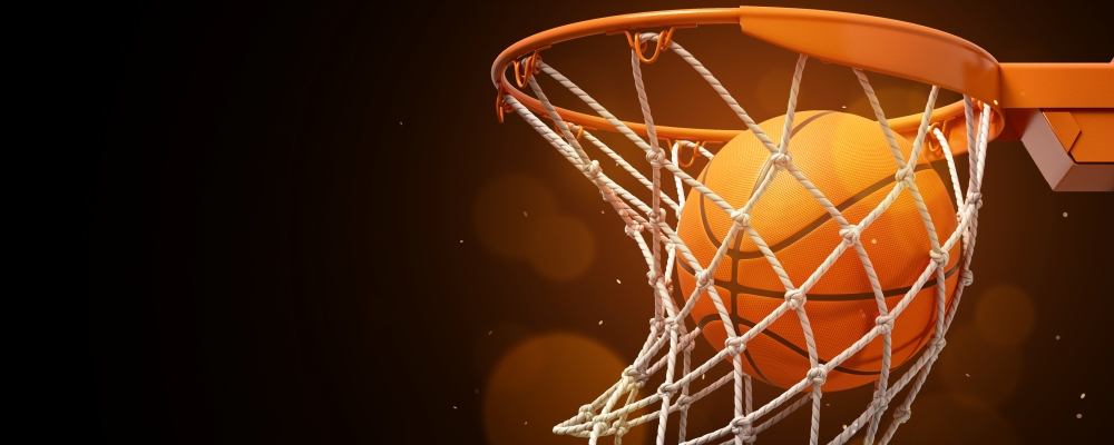 3d rendering of a basketball in the net on a dark background. Win game. Be success. Teamwork is key to triumph.
