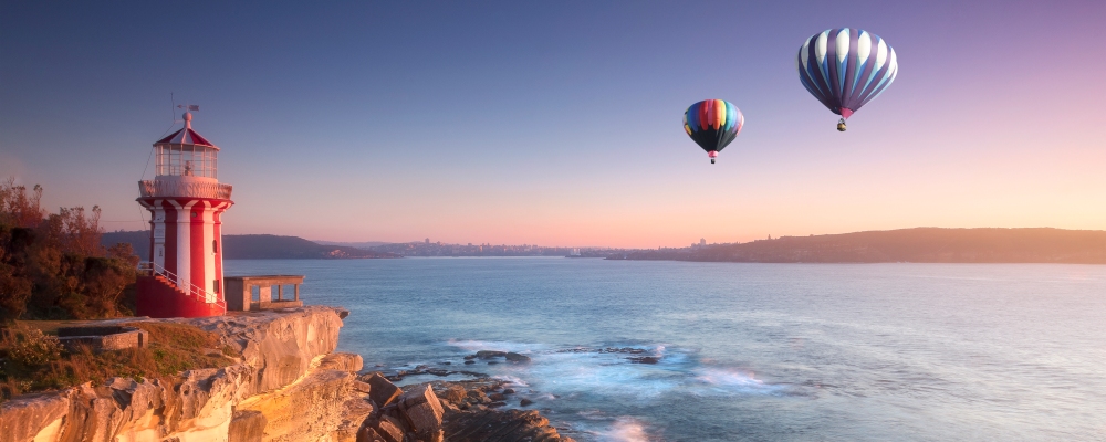 Hot air balloon fly over hornby lighthouse at watsons bay, Sydney, Australia