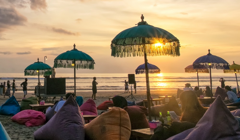 Sunset scene of Seminyak Beach Bali, Indonesia. Features a relaxed coastal ambiance.