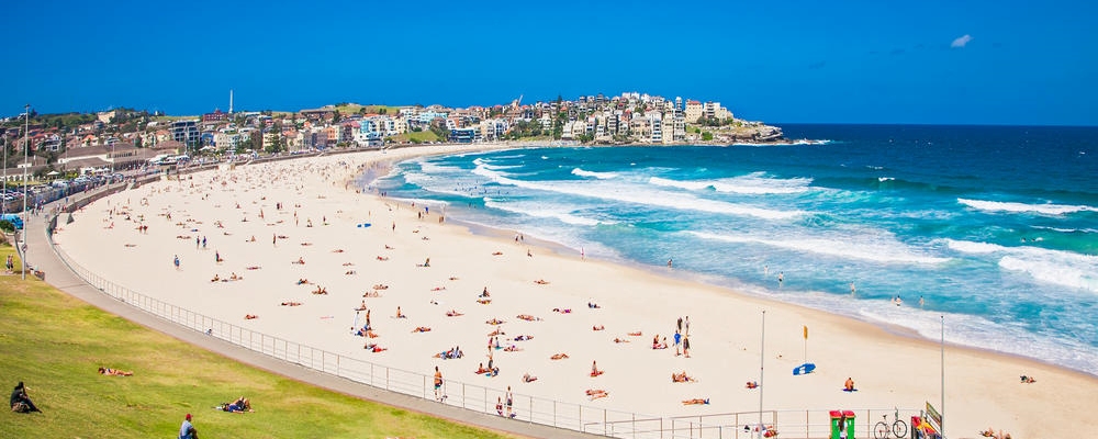 People relaxing on the Bondi beach in Sydney, Australia. Bondi beach is one of the most famous beach in the world.