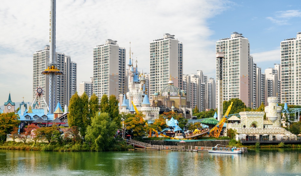 Beautiful view of scenic park at downtown of Seoul, South Korea. Residential high-rise buildings are visible on blue sky background. Wonderful cityscape. Seoul is a popular tourist destination of Asia