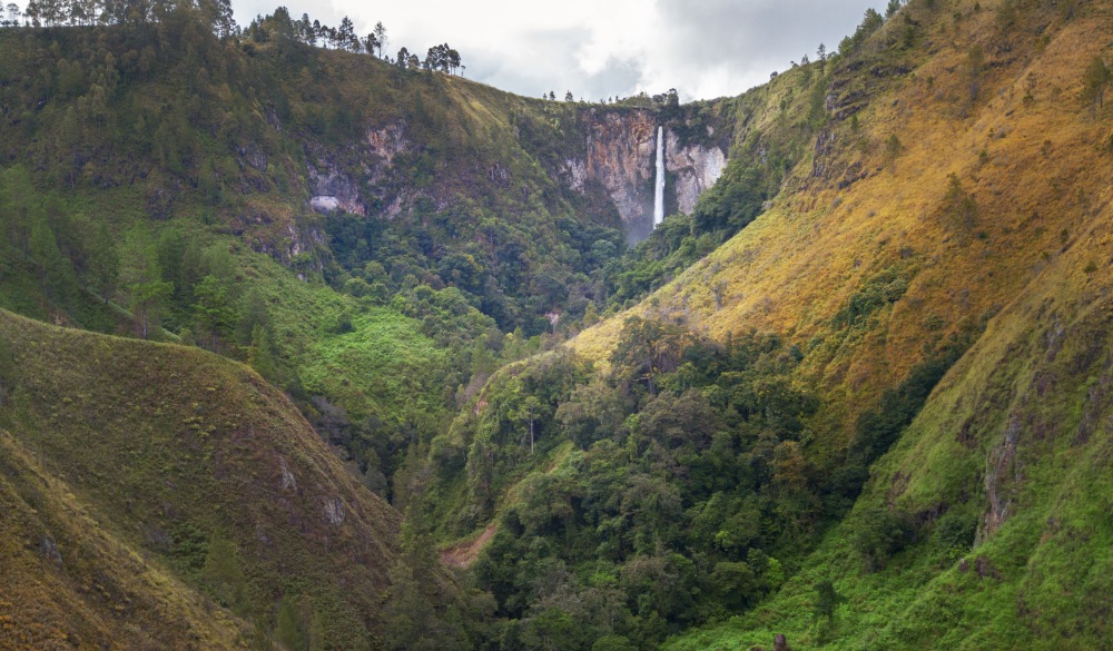 Aerial drone shot on the Sipiso-piso waterfall, Northern Sumatra, Indonesia; Shutterstock ID 792061996