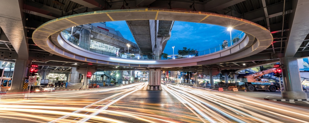 Busy traffic at night, Pathum Wan Intersection,  Bangkok , Thailand. (This is the name of an intersection and a lot of hotel and shopping center in Pathum Wan District, Bangkok)