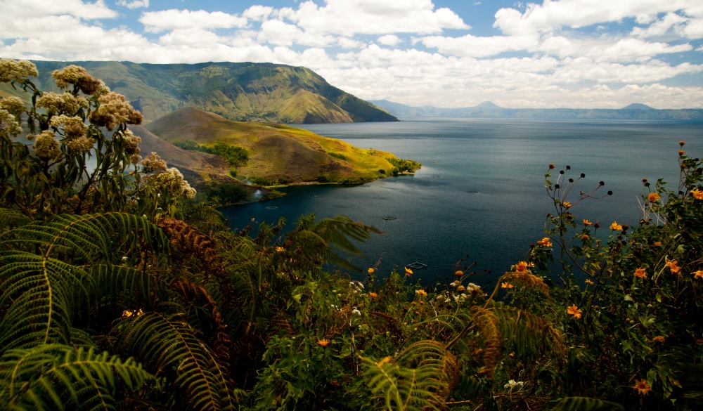 View of stunning Lake Toba and coast of Samosir Island in Sumatra, Indonesia.