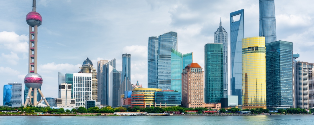 View of Pudong skyline (Lujiazui), Shanghai, China. Skyscrapers of downtown on waterfront. The Shanghai World Financial Center (SWFC) is visible at right, the Oriental Pearl Tower at left.