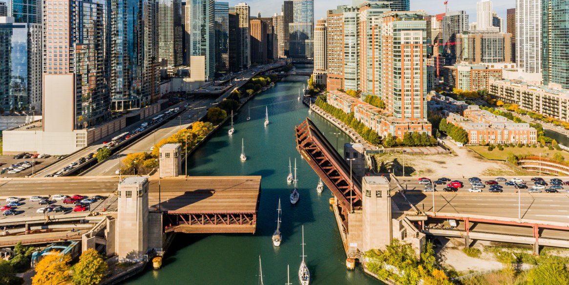 High Angle View Of River Amidst Buildings In City