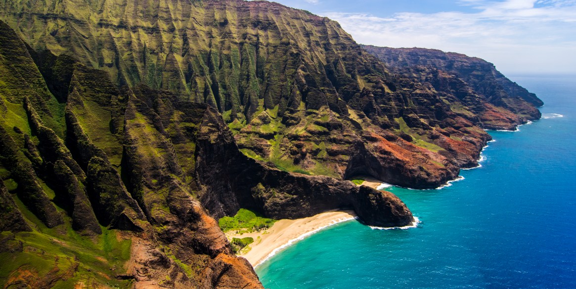 view of Honopu Arch at Na Pali coastline, Kauai,