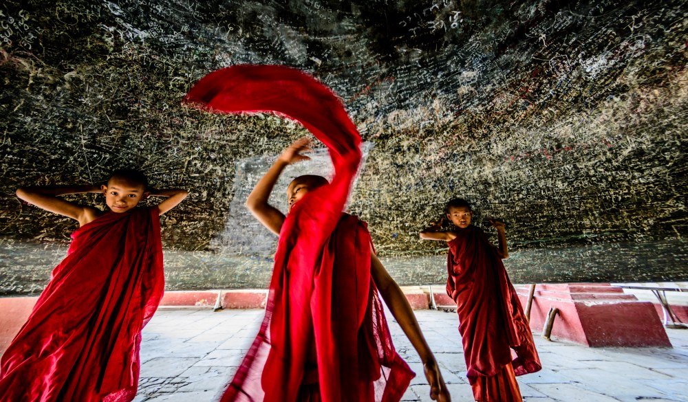 Asian monks dancing