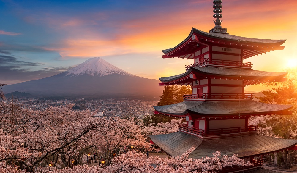 Beautiful view of mountain Fuji and Chureito pagoda at sunset, japan in the spring with cherry blossoms, Fujiyoshida, Japan