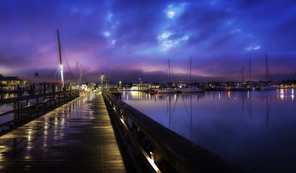 A pink morning sunrise on the Naples City Docks, Naples, FL.