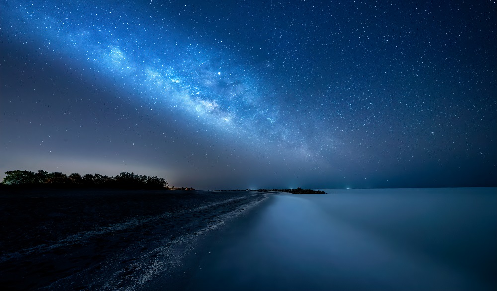 The Milky Way and Jupiter over Turner Beach on Captiva Island, Florida