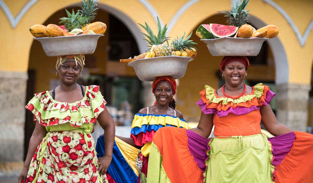 Happy group of women selling fruits in Cartagena