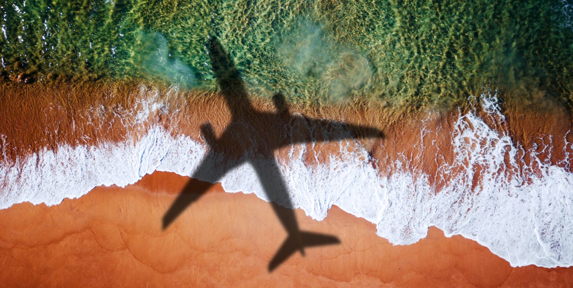 airplane over the beach for the destinations