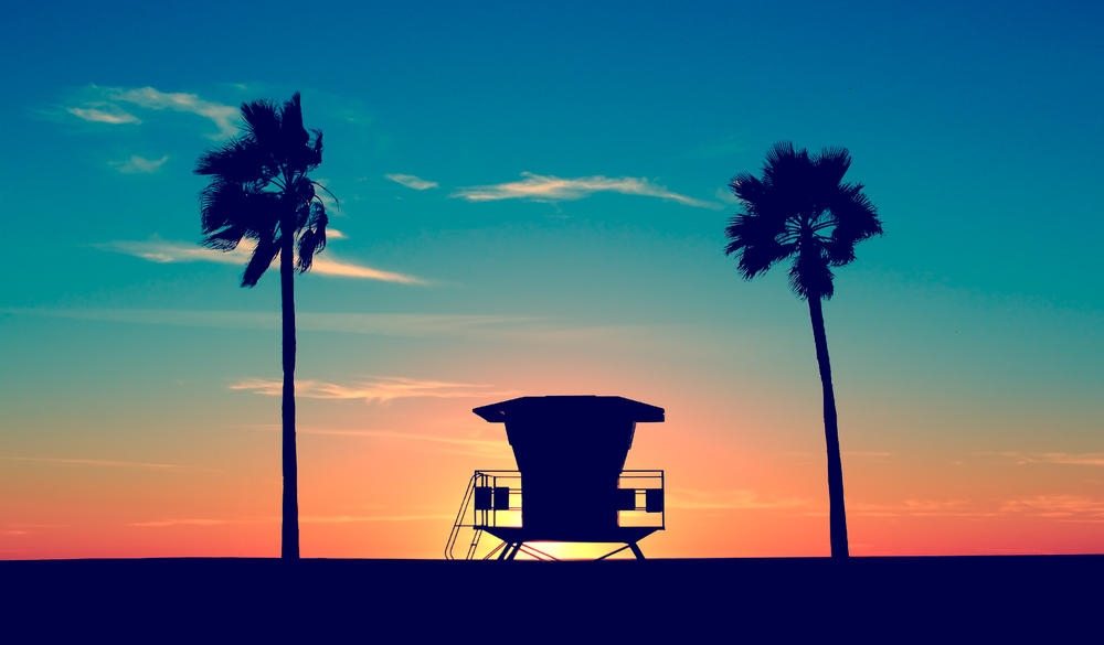 Vintage Lifeguard Tower on Beach at sunset in San Diego, California