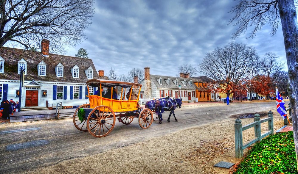 Colonial Williamsburg, in Virginia, is a wonderful place to visit near Christmas. Beautiful and historic Christmas decorations are all around and the Christmas carols sung after the Fife and Drum march tops off visit!