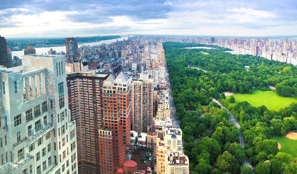 View of Trump Intl hotel and tower with skyline, Central Park, New York.