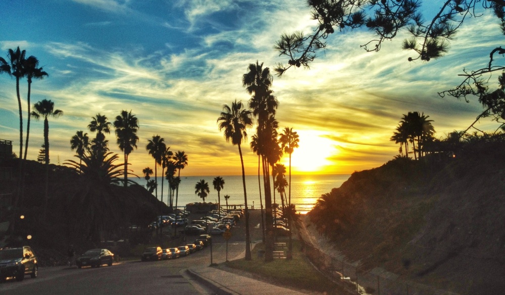 Cars on the street at sunset, spring break destinations