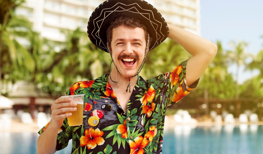 Tourist drinking beer, cinco de Mayo celebration