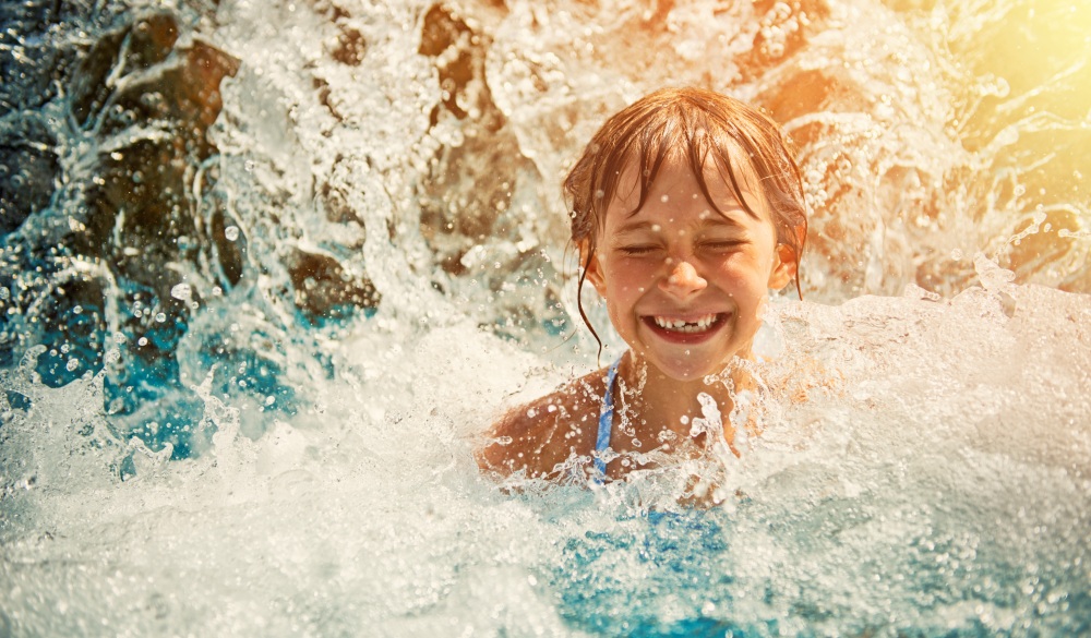 Little girl in waterpark, family hotels in Dubai