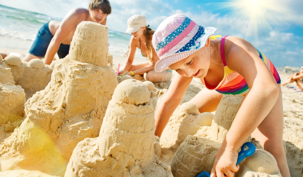 family building a sandcastle