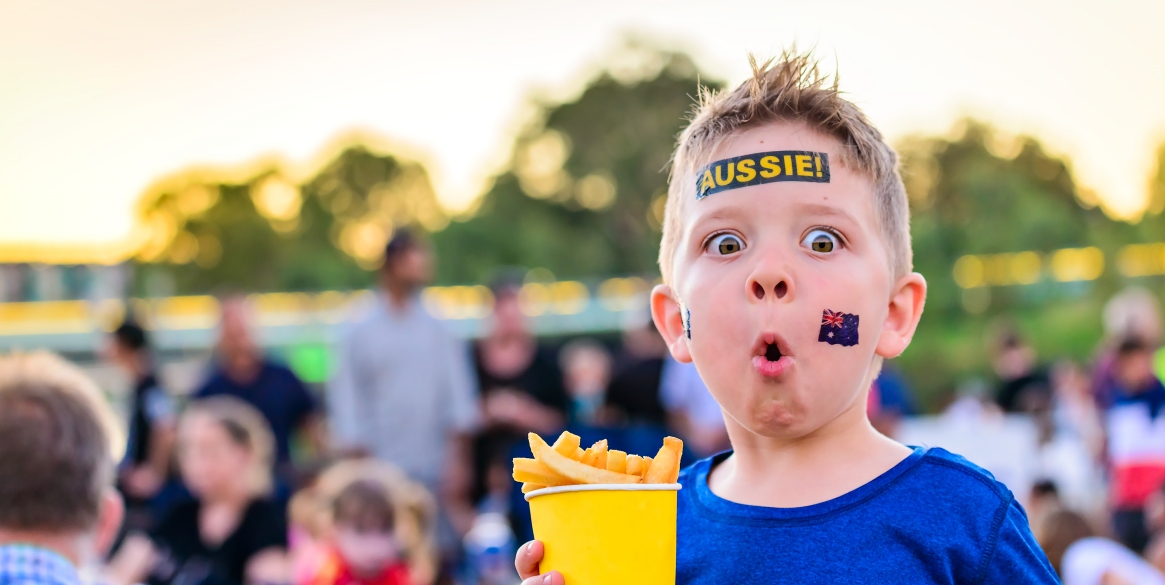 Australian boy with flag tattoo on his face