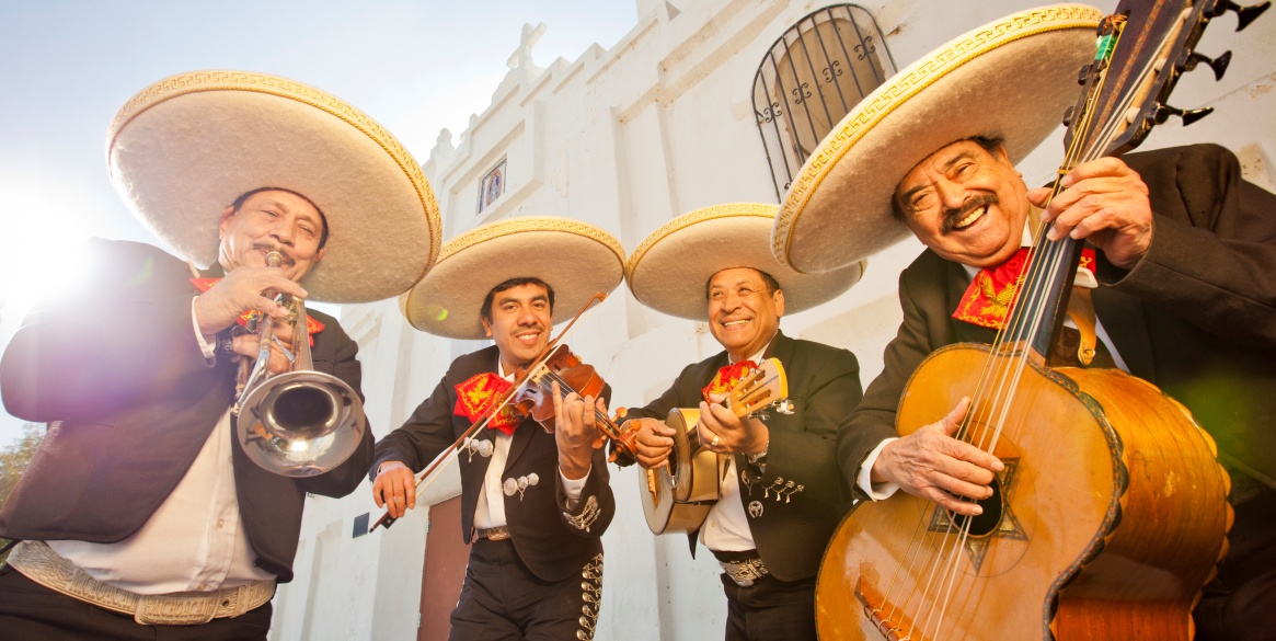 Group of four Musicians playing Mariachi music