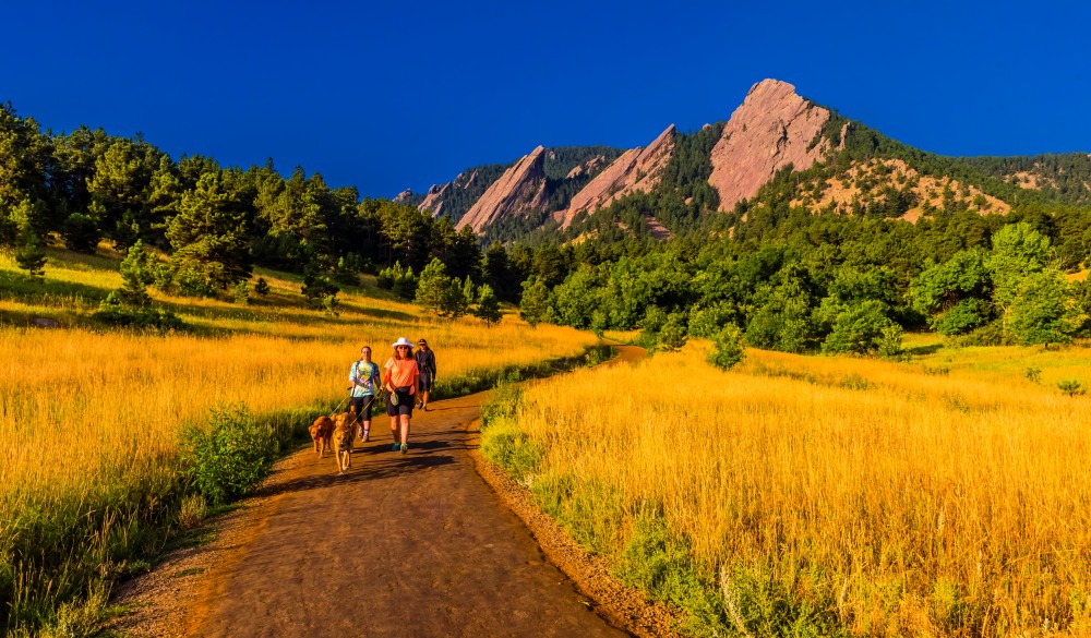 Hikers walking their dogs, The Flatirons Chautauqua Park, Boulder, mother's day getaway