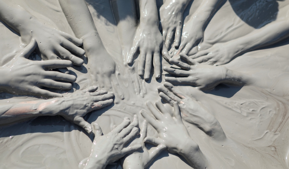 Friends in the Totumo Mud Volcano, natural mud bath