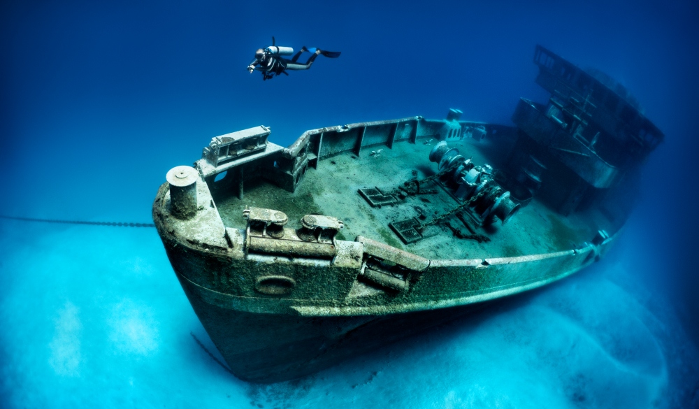 The ex-USS Kittiwake was a Submarine Rescue vessel (ASR-13). She was part of the 6th Submarine squadron (SUBRON 6) home ported at the Destroyer-Submarine piers in Norfolk, VA. The location for sinking the Kittiwake is at the northern end of Seven Mile Beach, on the West or lee side of Grand Cayman.