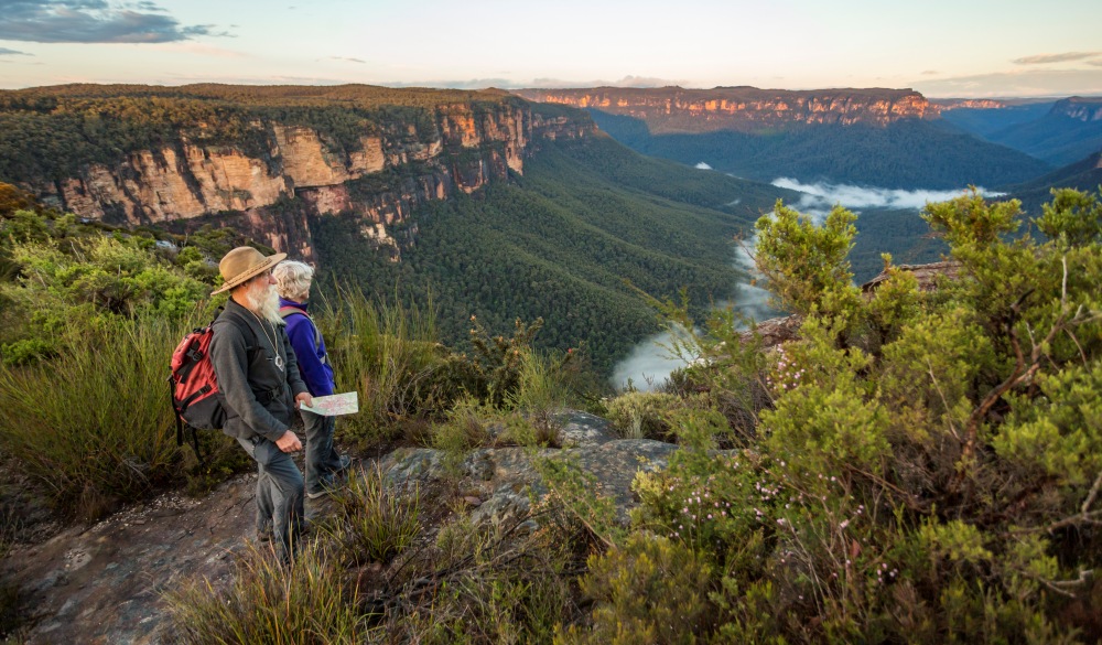 Senior couple enjoying the view while bushwalking in the spectacular Australian Blue Mountains