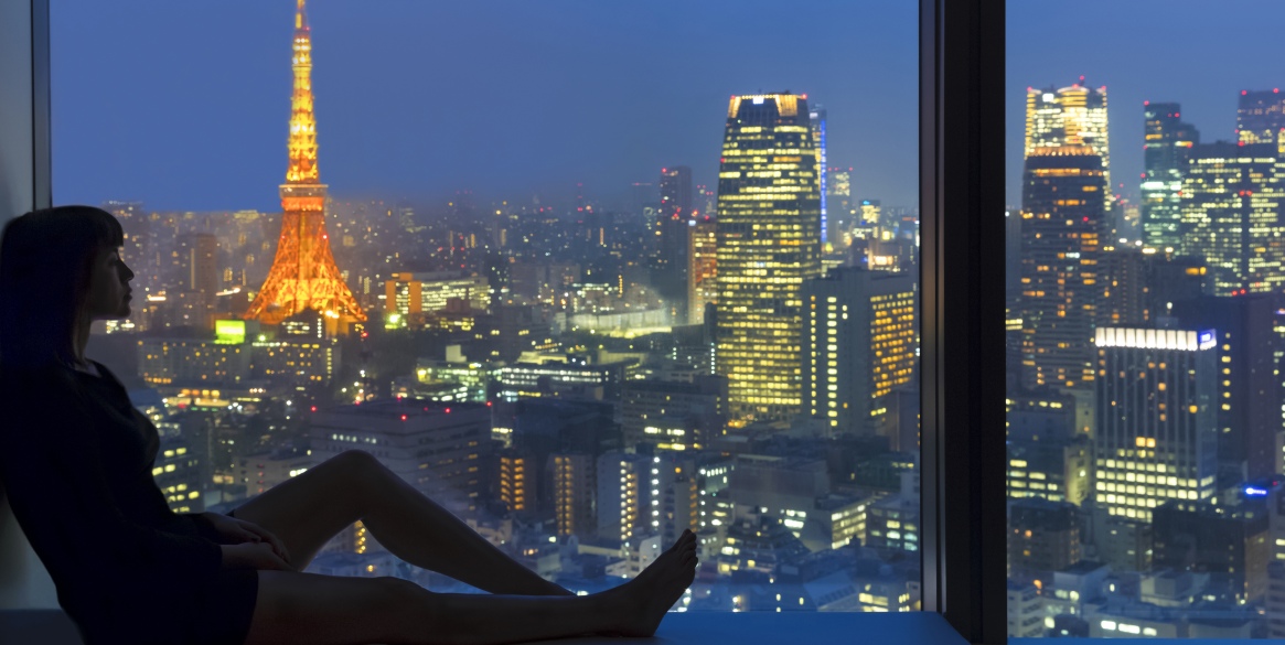 Woman looking at the view of Tokyo cityscape,