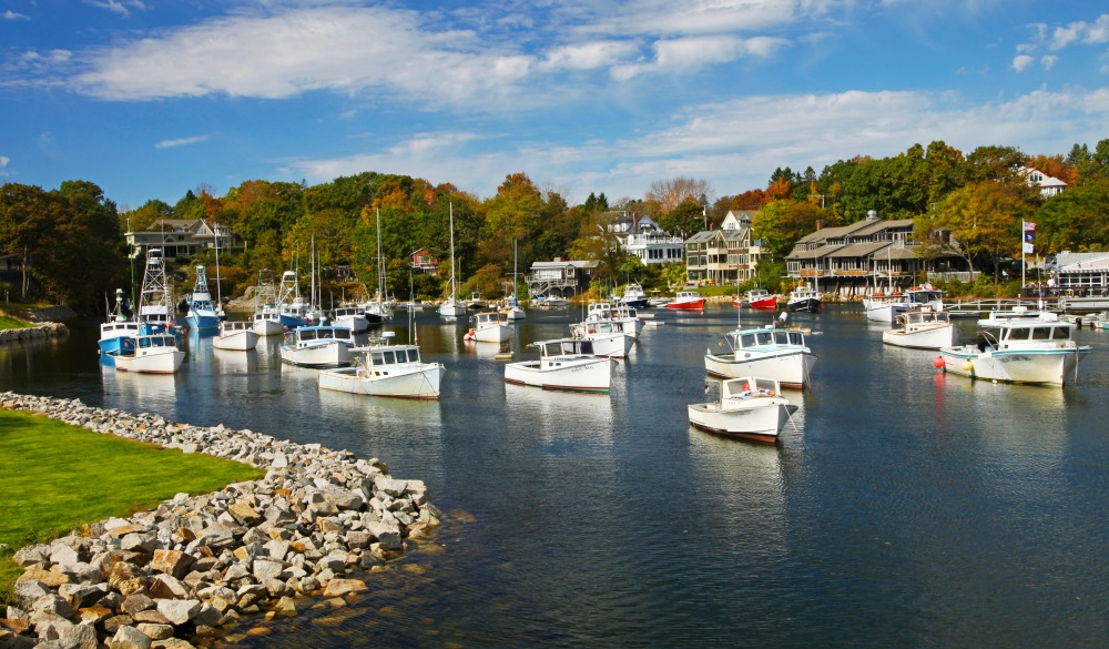 Perkins Cove is a lovely spot to spend a summer vacation evening or in fall day when the trees change their colors.