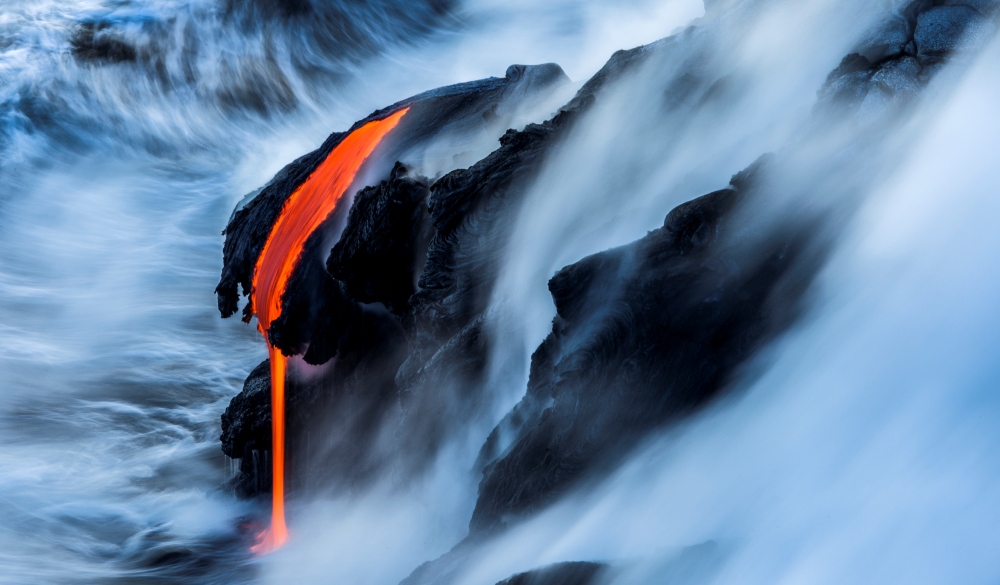 Lava from Kilauea spills into the Pacific Ocean off the coast of the big island 