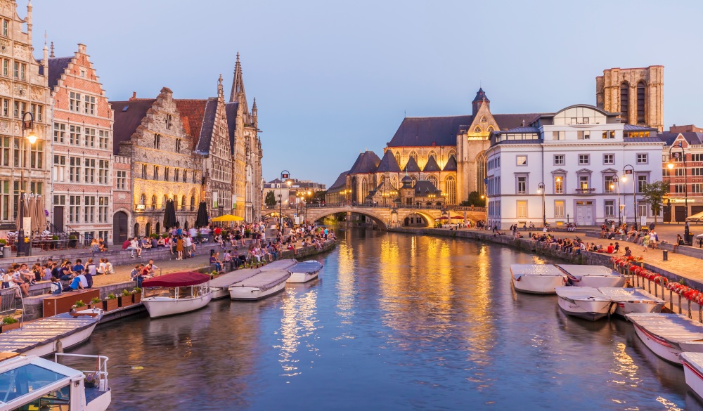 Belgium, Ghent, old town, Korenlei and Graslei, historical houses at River Leie at dusk