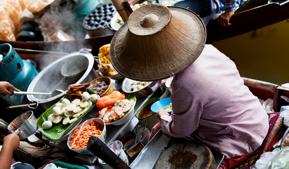 Food vendor at the Damnoen Saduak Floating Market near Bangkok.