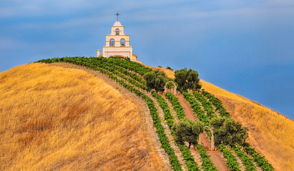 This is a photo of a small chapel on a hill. The chapel can be seen while driving on Highway 46 east of Paso Robles, California.