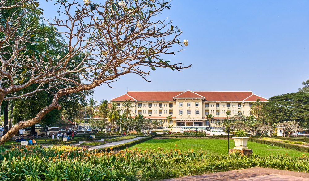 SIEM REAP, CAMBODIA - FEBRUARY 2, 2018: Raffles Grand Hotel D'Angkor view from Royal Independence Gardens