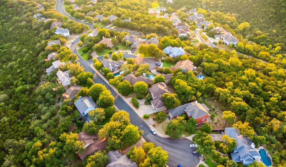 Austin Texas hill country, suburban countryside homes, aerial view