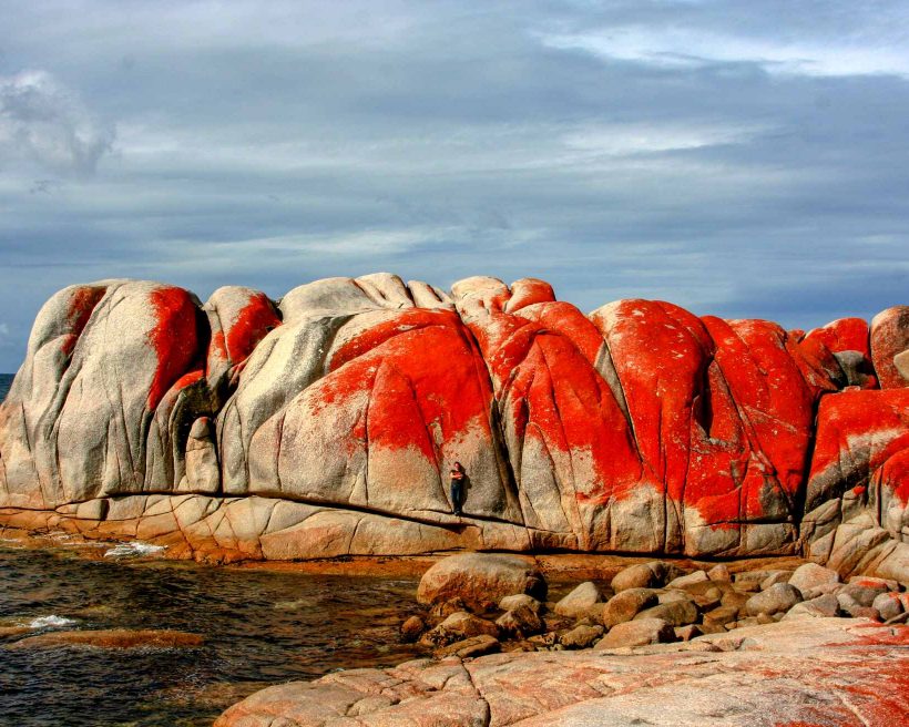 Rock Formation By Sea Against Sky