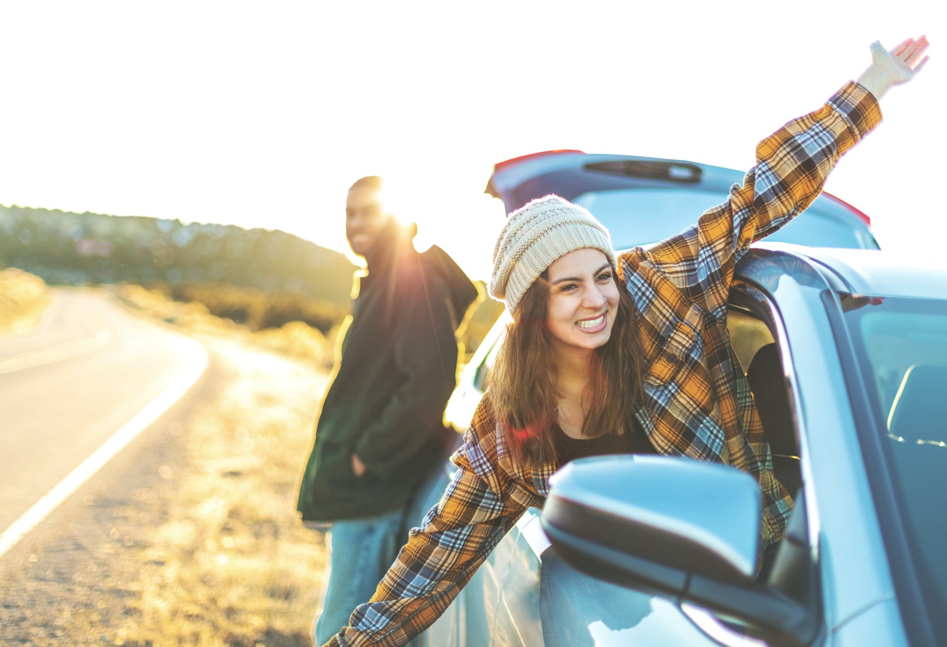 Couple Outdoor Adventure At Sunset Experiencing Golden Sunset Freedom in Western Colorado