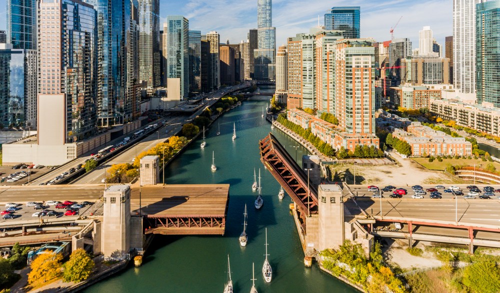 High Angle View Of River Amidst Buildings In City