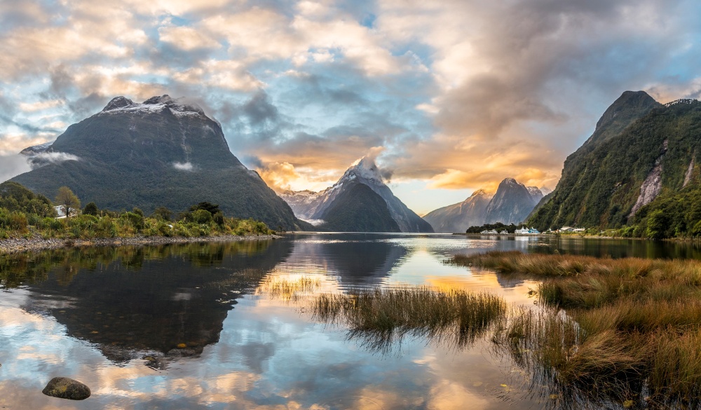 Mitre Peak reflecting in the water, sunset, Milford Sound, Fiordland National Park, Te Anau, Southland Region, Southland, New Zealand