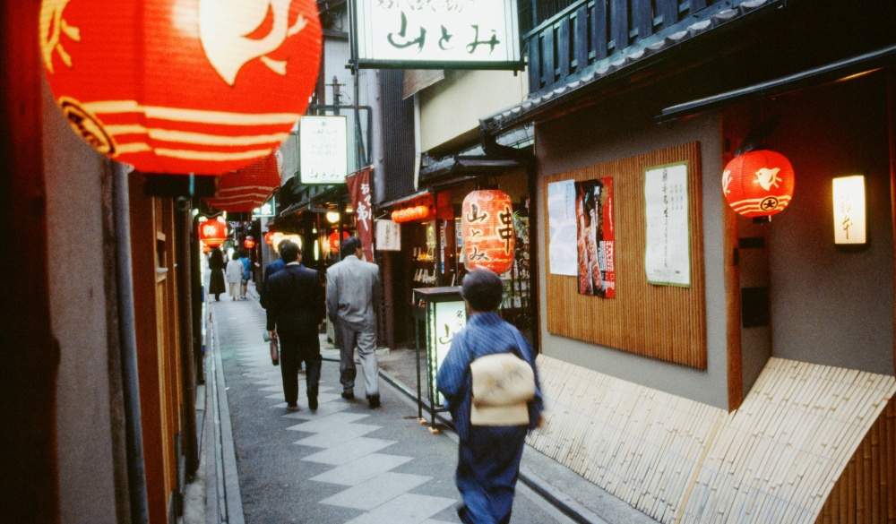 Group of people walking on a street, Pontocho Geisha District, Kyoto, Japan